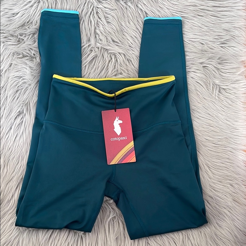 Cotopaxi women’s Leggings in Teal and Yellow